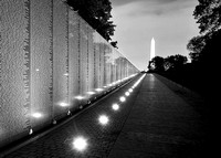 Vietnam Memorial with Washington Monument at Night